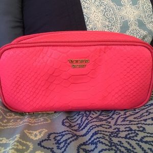 Victoria’s Secret: pink reptile makeup bag